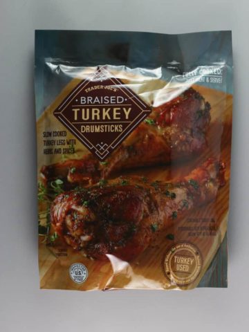 An unopened bag of Trader Joe's Braised Turkey Drumsticks