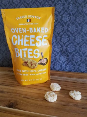 A package of Trader Joe's Oven Baked Cheese Bites with some out of the package