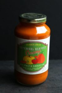 An unopened jar of Trader Joe's Autumnal Harvest Creamy Pasta Sauce