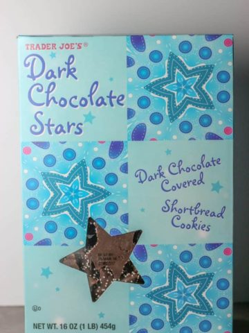 Trader Joe's Dark Chocolate Stars box unopened on a grey surface.