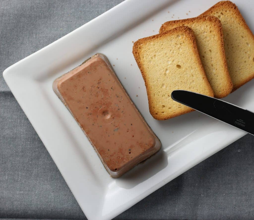 Trader Joe's Brioche Toasts pictured next to Trader Joe's Truffle Mousse Pate