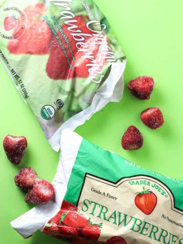Trader Joe's Frozen Organic Strawberries and regular strawberries side by side