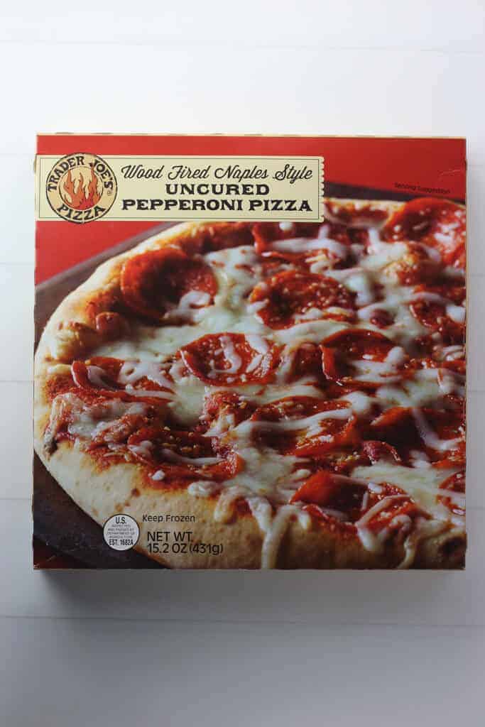 An unopened box of Trader Joe's Wood Fired Naples Style Uncured Pepperoni Pizza box