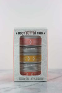 An unopened package of Trader Joe's Body Butter Trio