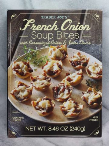 An unopened box of Trader Joe's French Onion Soup Bites