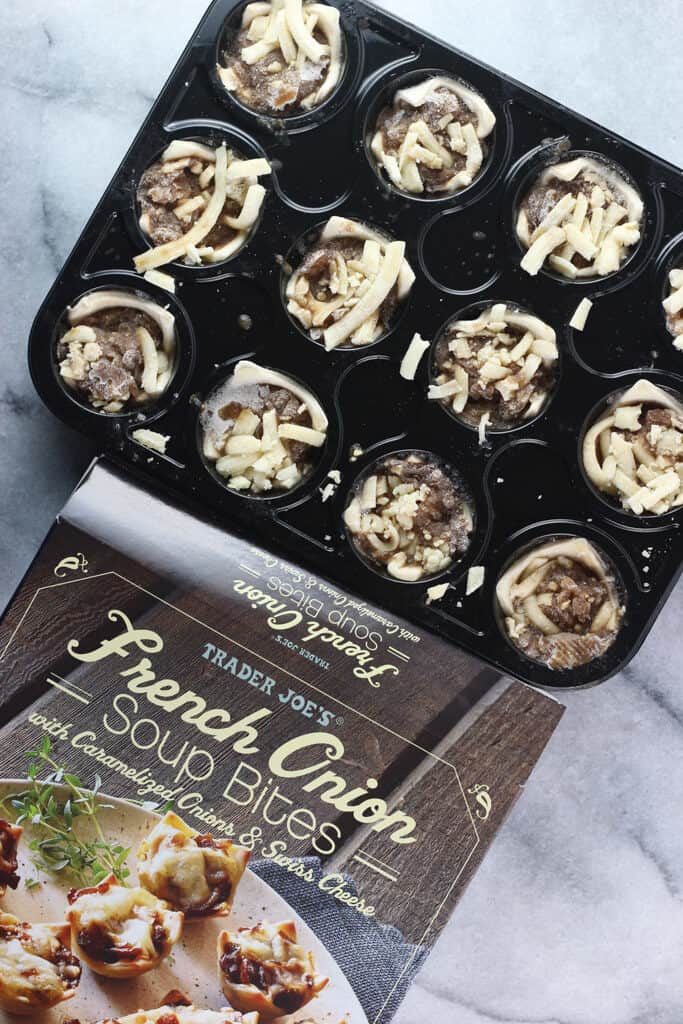 An opened box of Trader Joe's French Onion Soup Bites before they are cooked