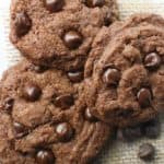 A top view of three Chocolate Chocolate Chip Cookies