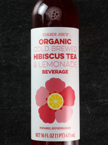 An unopened container of Trader Joe's Organic Cold Brewed Hibiscus Tea and Lemonade