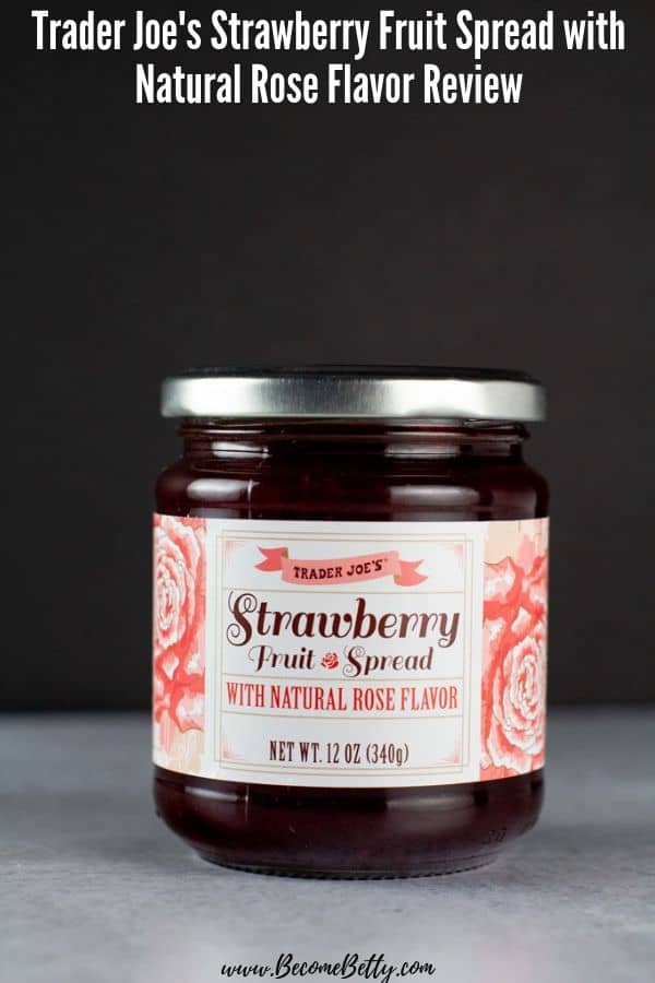 An unopened jar of Trader Joe's Strawberry Fruit Spread with Natural Rose Flavor image for Pinterest