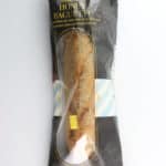 An unopened loaf of Trader Joe's Honey Baguette