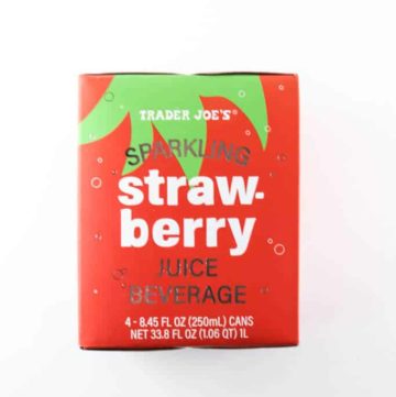 An unopened box of Trader Joe's Sparkling Strawberry Juice Beverage