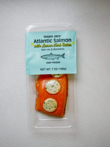 An unopened package of Trader Joe's Atlantic Salmon with Lemon Herb Butter