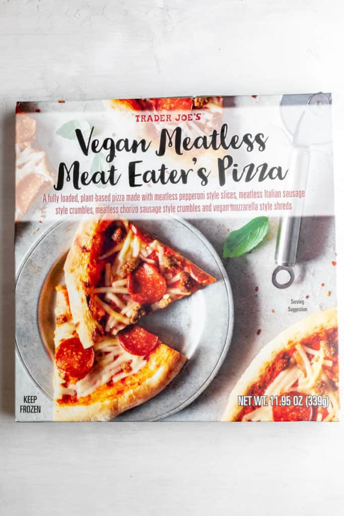 An unopened box of Trader Joe's Vegan Meatless Meat Eater's Pizza