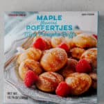 Trader Joe's Maple Poffertjes Mini Pancakes unopened on a grey surface