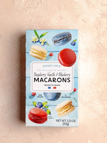 An unopened box of Trader Joe's Raspberry Vanilla and Blueberry Macarons.