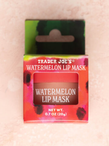 Trader Joe's Watermelon Lip Mask on a pink surface.