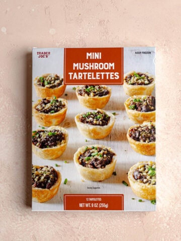 An unopened box of Trader Joe's Mini Mushroom Tartelettes.