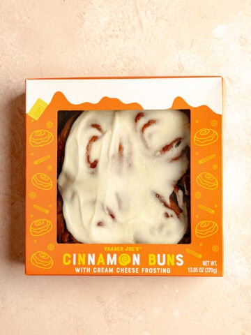 An unopened box of Trader Joe's Cinnamon Buns with Cream Cheese Frosting.