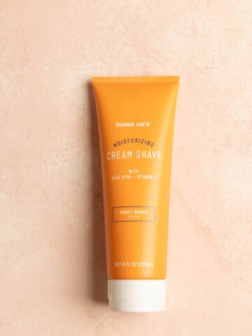 Trader Joe's Moisturizing Cream Shave on a pink surface.