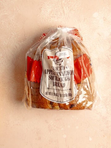 An unopened package of Trader Joe's Sliced Apple Cinnamon Sourdough Bread.