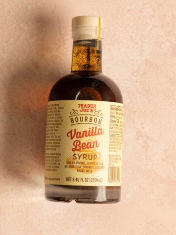 An unopened bottle of Trader Joe's Bourbon Vanilla Bean Syrup.