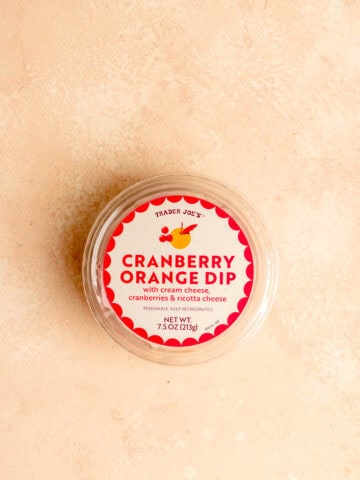 An unopened container of Trader Joe's Cranberry Orange Dip.