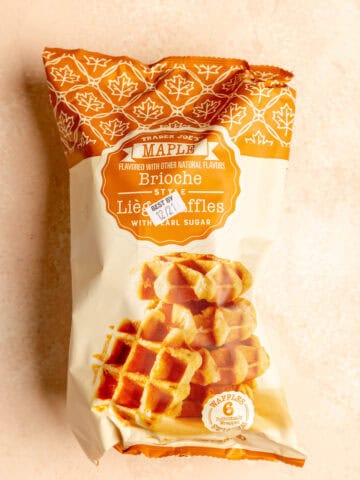 An unopened bag of Trader Joe's Maple Brioche Liege Waffles.
