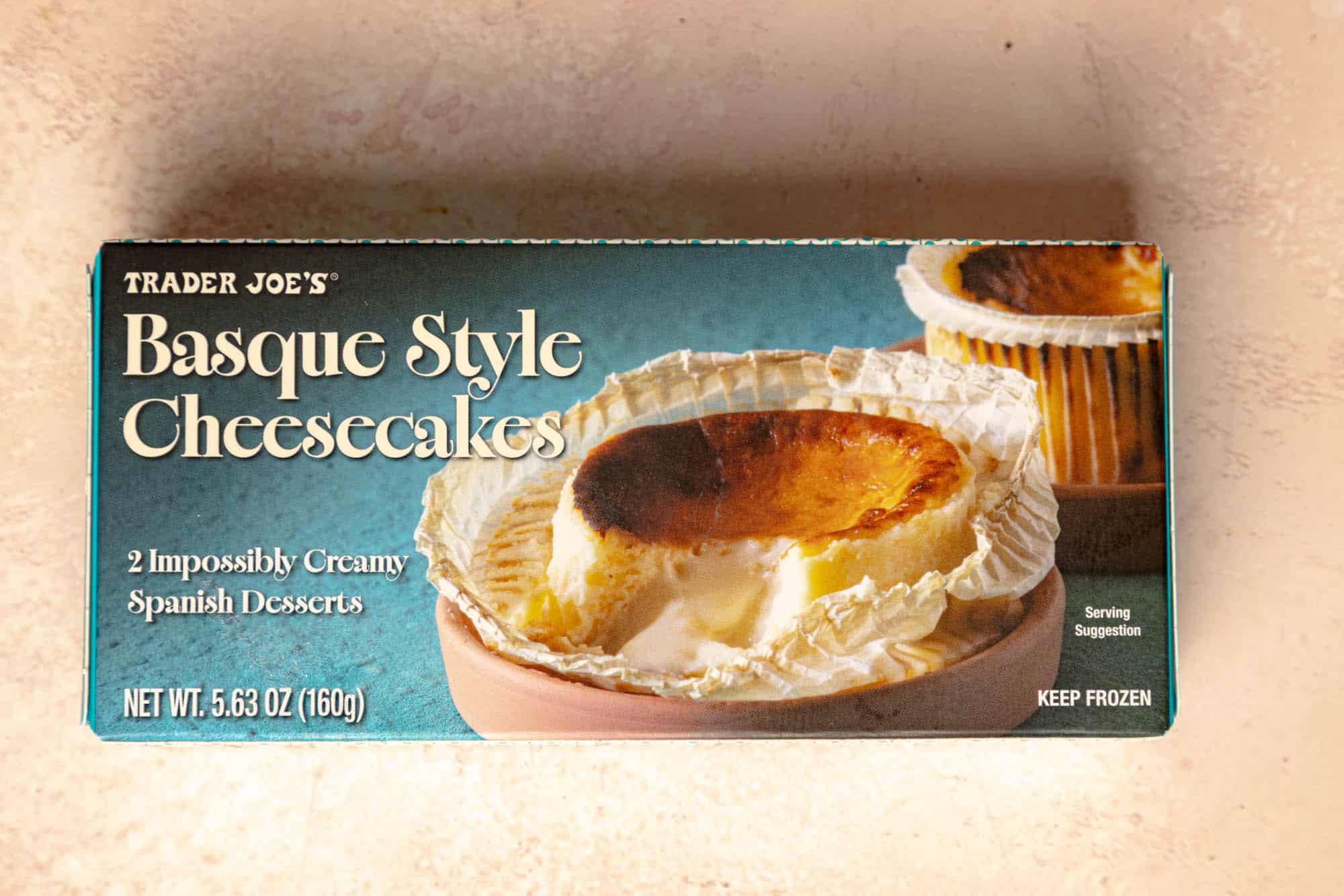 An unopened box of Trader Joe's Basque Style Cheesecakes.