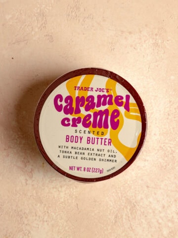 An unopened package of Trader Joe's Caramel Creme Scented Body Butter.
