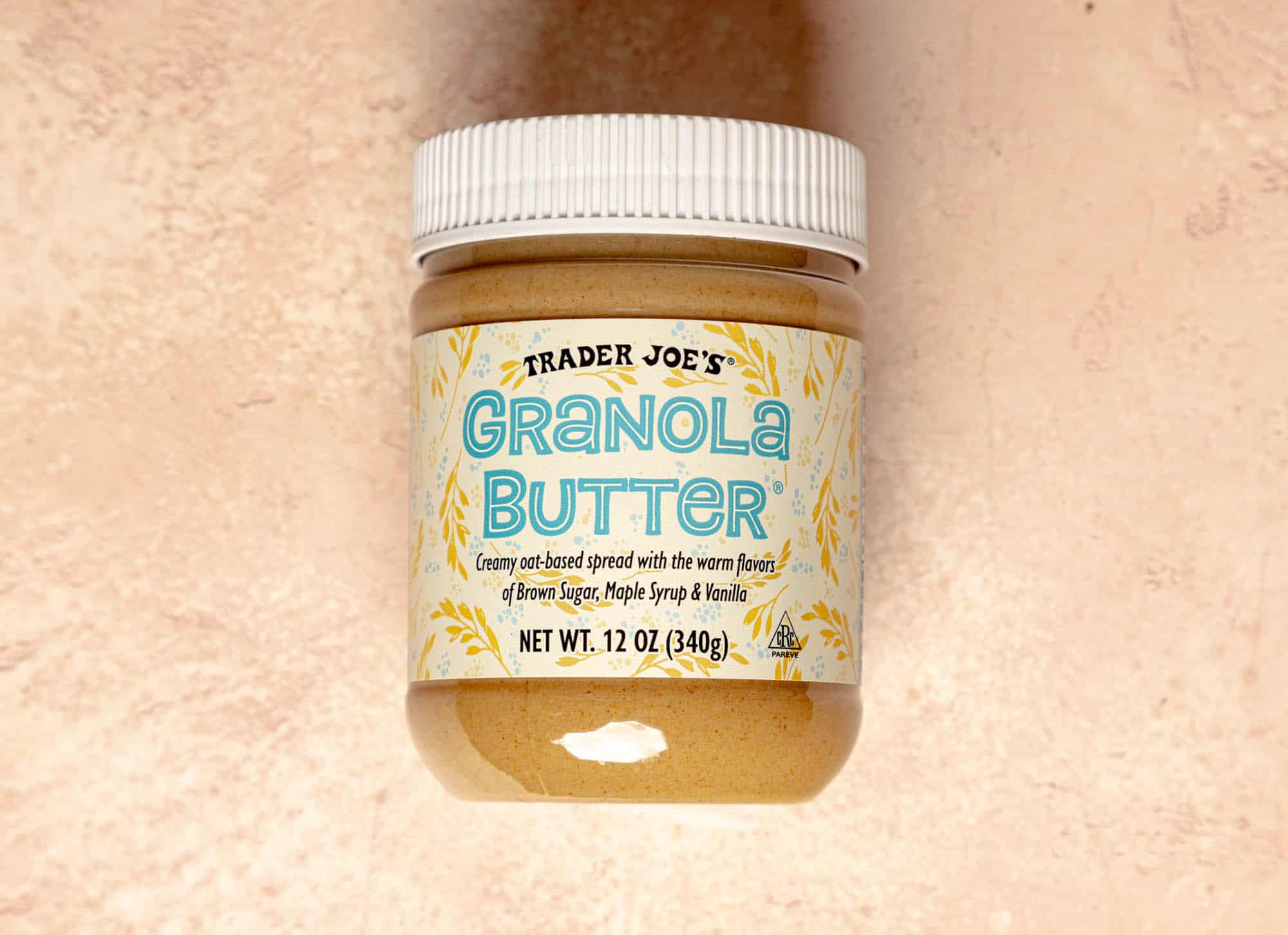An unopened jar of Trader Joe's Granola Butter.